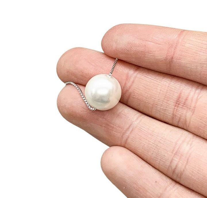 Collier avec une perle flottante, cadeau symbolique pour les femmes atteintes du SOPK, pendentif pour le syndrome des ovaires polykystiques