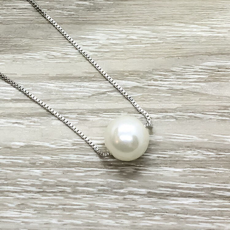 Collier avec une perle flottante, cadeau symbolique pour les femmes atteintes du SOPK, pendentif pour le syndrome des ovaires polykystiques